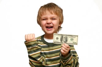 this little tyke really loves money