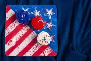 Tasty independence day cupcakes in red, white and blue