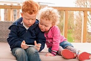 boy and girl on iphone